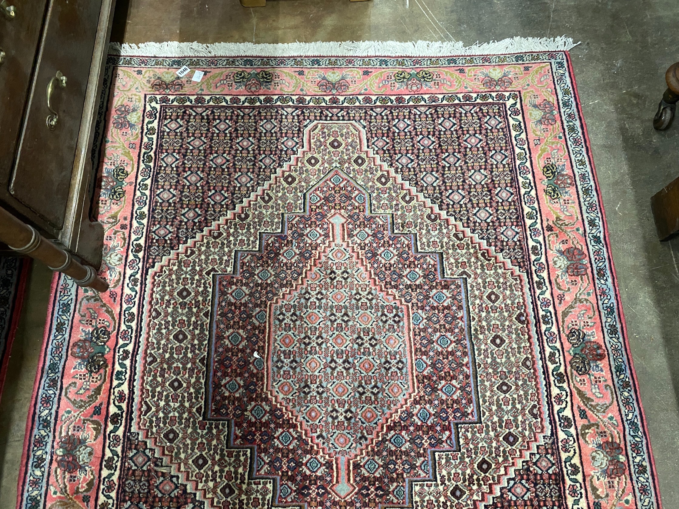 A Senneh blue ground rug, 142 x 122cm